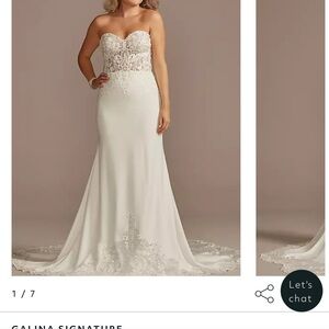 Wedding dress already bustled with the straps added. One of a kind train.